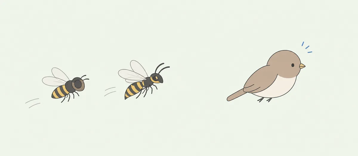 スズメバチに似た模様の虫と、それを避ける鳥